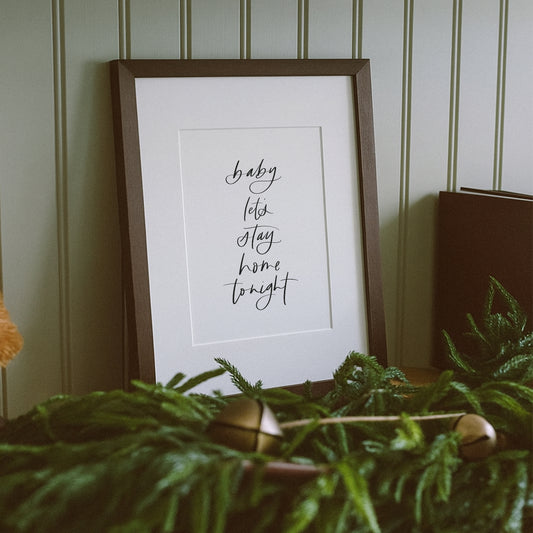 cozy hand lettered wall art print saying baby lets stay home tonight