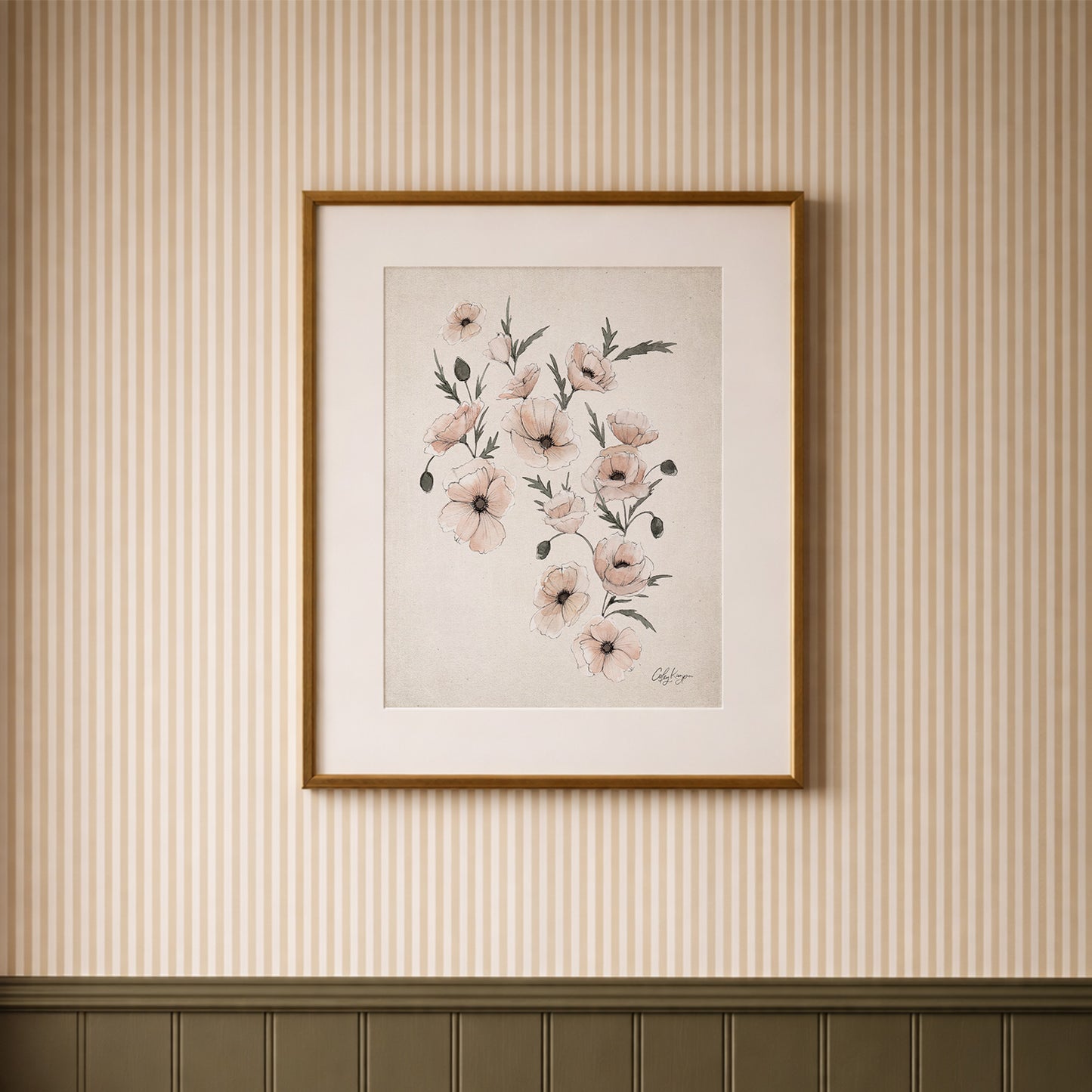 Framed August poppy birth flower watercolor art print in soft neutral tones on a wall with striped wallpaper