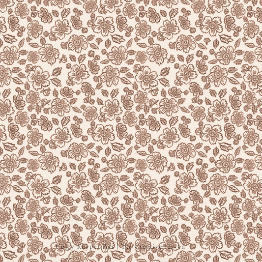 Pattern of small flowers in brown on a beige background
