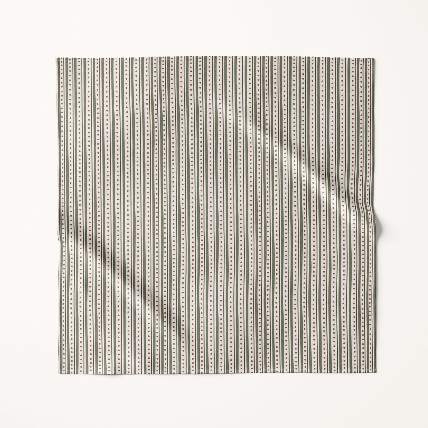 Christmas green stripes fabric square with a subtle pattern on a cream background