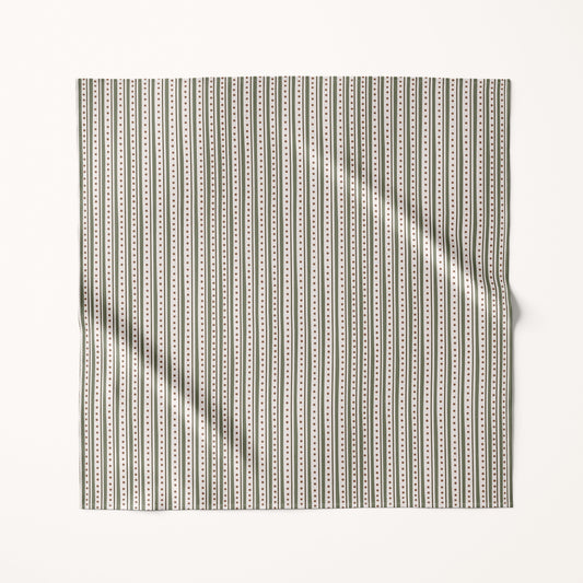 Christmas green stripes fabric square with a subtle pattern on a cream background