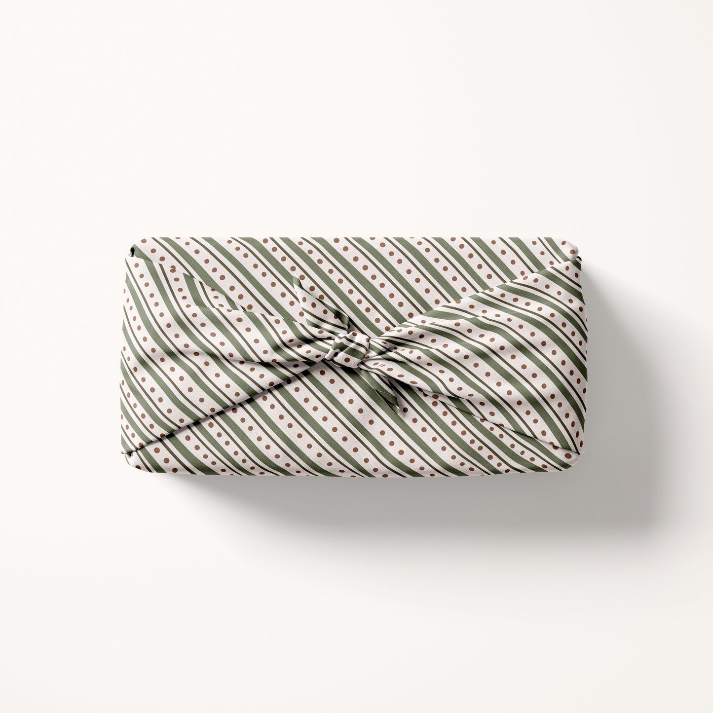 Christmas striped fabric gift wrap with a striped pattern on a white background