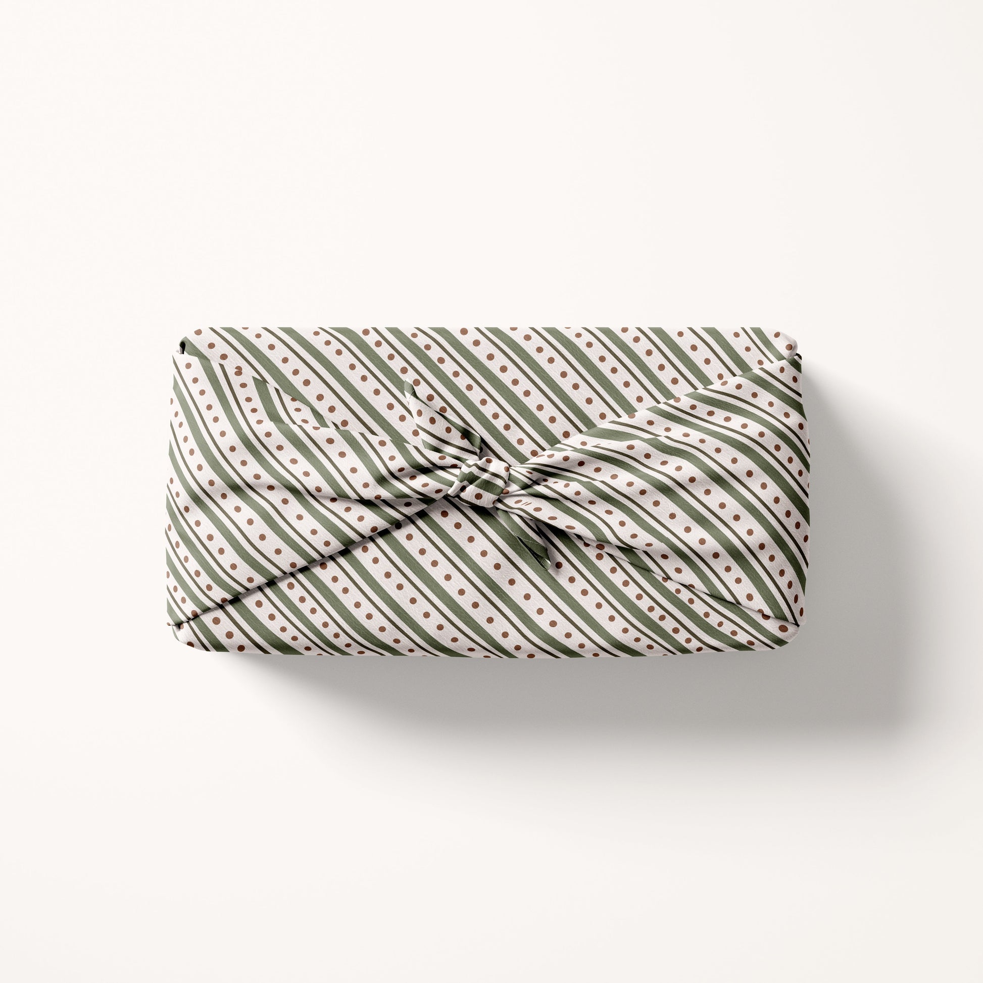 Christmas striped fabric gift wrap with a striped pattern on a white background