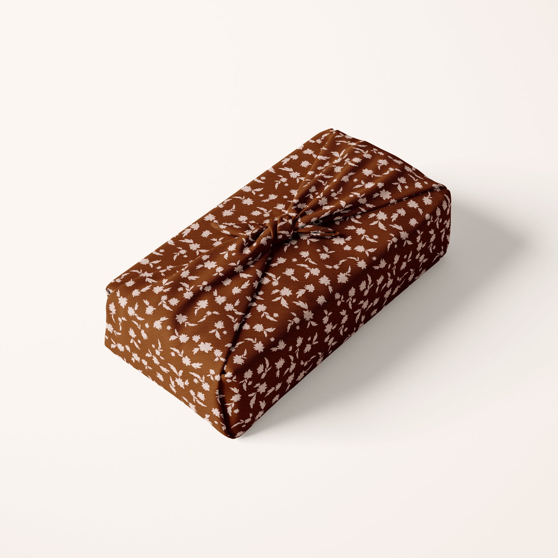 Blush Christmas florals on red fabric wrap on cream background