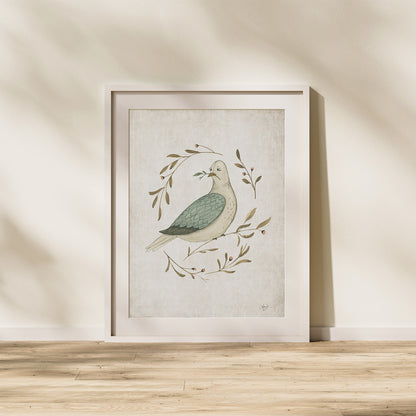 Framed artwork of a dove with leaves on a beige wall. watercolor dove peace on earth christmas art print