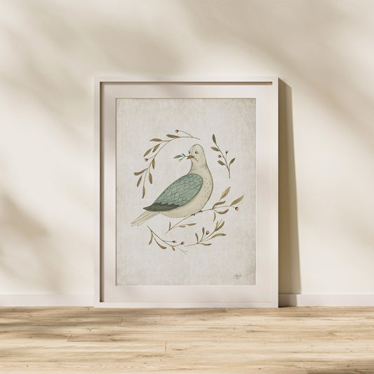 Framed artwork of a dove with leaves on a beige wall. watercolor dove peace on earth christmas art print