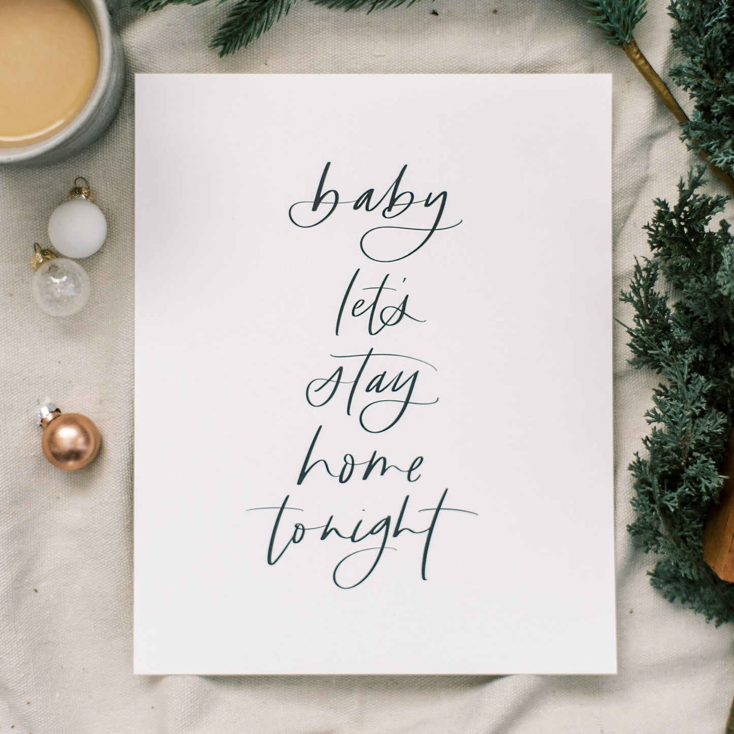 cozy hand lettered wall art print saying baby lets stay home tonight